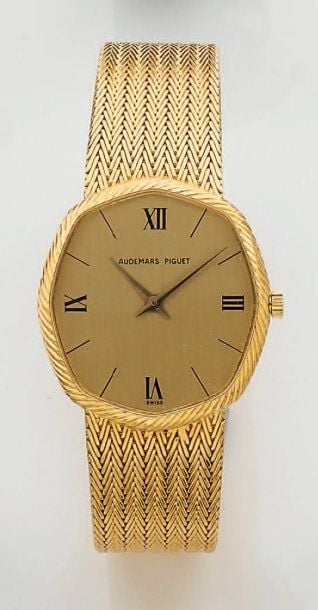 BRACELET MONTRE octogonale en or jaun