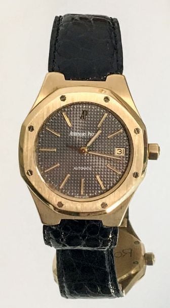 BRACELET MONTRE octogonale, modèle «Royal Oak», en or jaune (750 millièmes