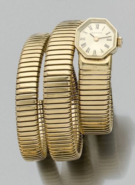 BRACELET MONTRE octogonale «serpent» spirotube en or jaune (750 millièmes