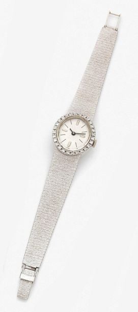•BRACELET MONTRE ovale de dame en or gris (750‰