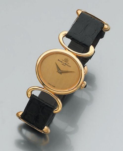 BRACELET MONTRE ovale, de dame, en or jaun
