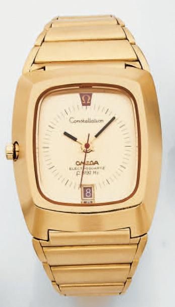 BRACELET MONTRE rectangulaire en or jaune satiné, modèle «Constellation», pour gauche