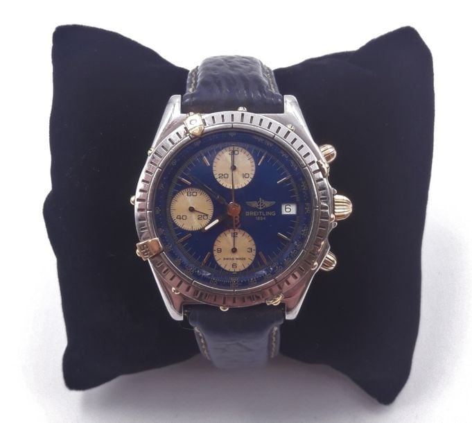 BRACELET MONTRE ronde chonographe, tachymètre, en acier et métal doré, modèle «Chronomat