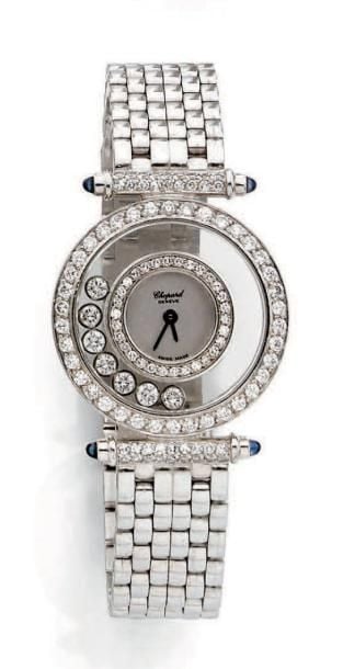 BRACELET MONTRE ronde, de dame en or gris (750 millièmes