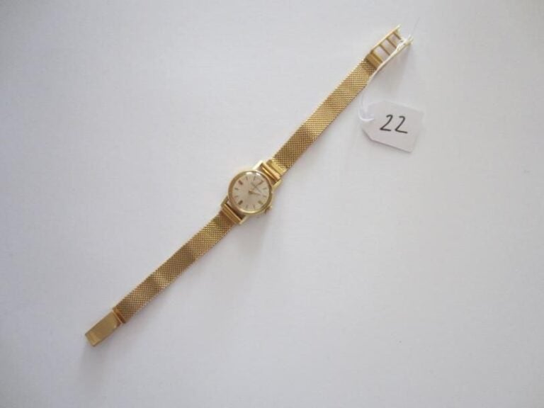 BRACELET MONTRE ronde de dame en or jaun