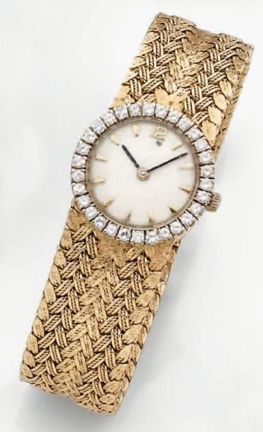 BRACELET MONTRE ronde de dame en or jaun