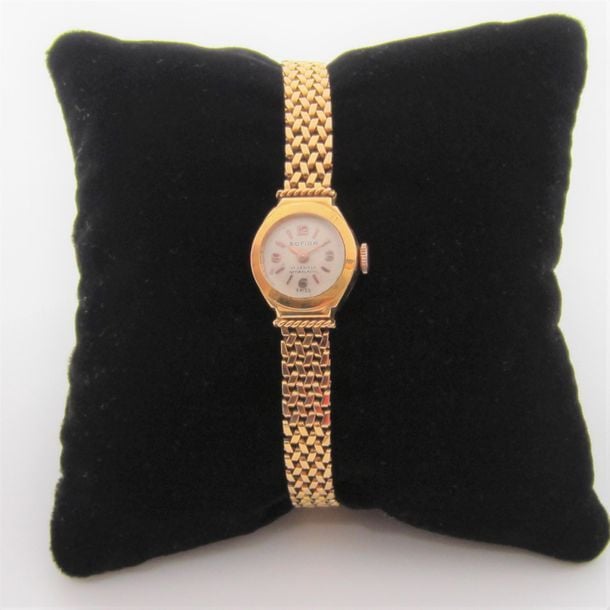 BRACELET MONTRE ronde de dame en or jaune (750 millièmes
