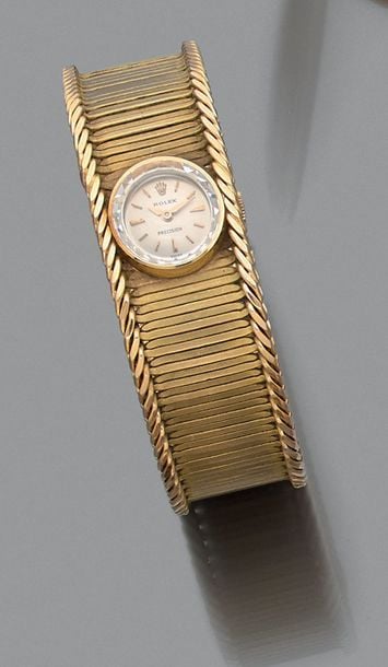 BRACELET MONTRE ronde de dame en or jaune (750 millièmes