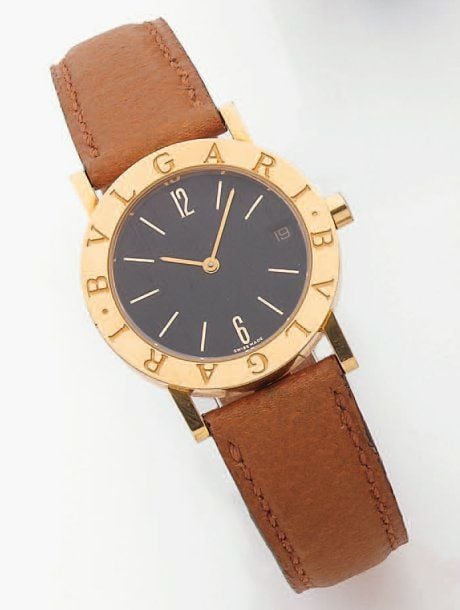 BRACELET MONTRE ronde en or jaun