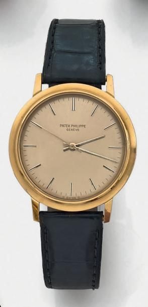 BRACELET MONTRE ronde en or jaune (750 millièmes