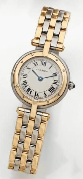 BRACELET MONTRE ronde, en or jaune et acie