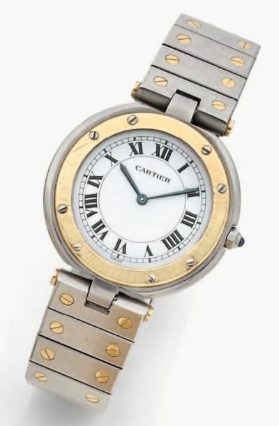 BRACELET MONTRE ronde, en or jaune et acie