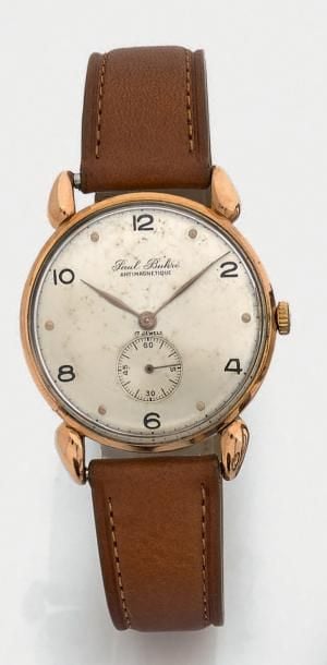 BRACELET MONTRE ronde en or jaune et or rose (750 millièmes