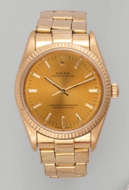 BRACELET MONTRE ronde en or jaune, modèle « Oyster Perpetual