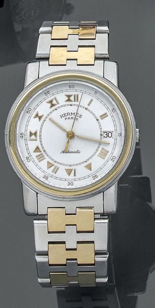 BRACELET MONTRE ronde, modèle «Carrick» en acier et métal dor