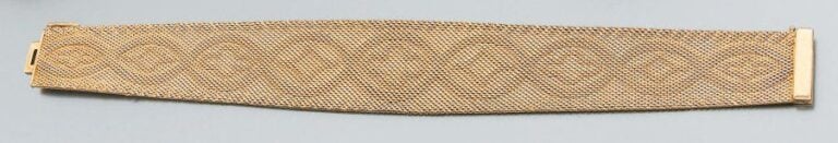 BRACELET « ruban » en or rose, en chute, à motifs quadrilobés et losange