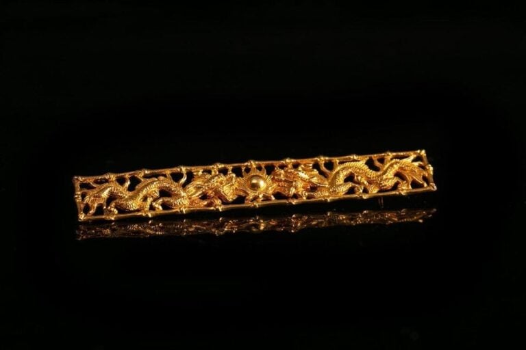 BROCHE EN OR 14K AUX DRAGONS