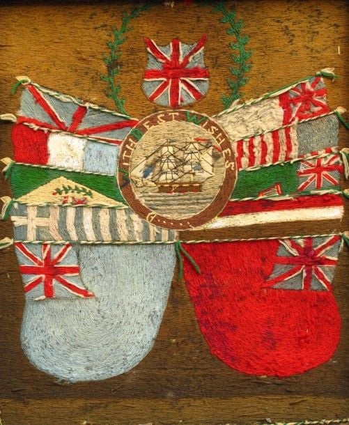 Broderie de laine - Voilier entouré de drapeaux «With Best Whishes» Travail de matelot, XIXe siècle 50 x 41 cm