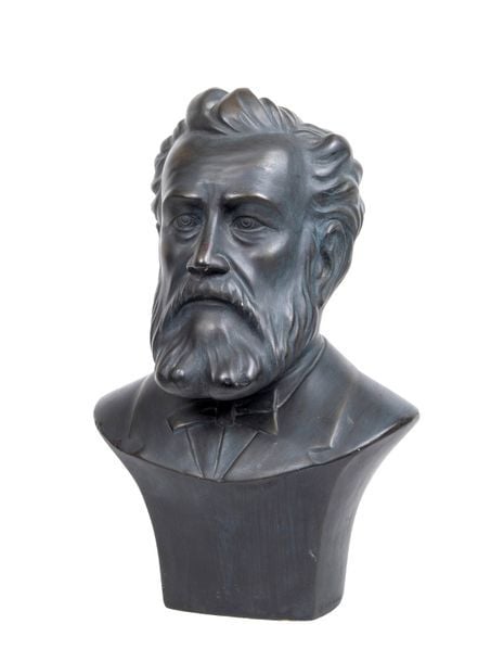 Buste de Jules Verne en plâtre vernissé noir par E