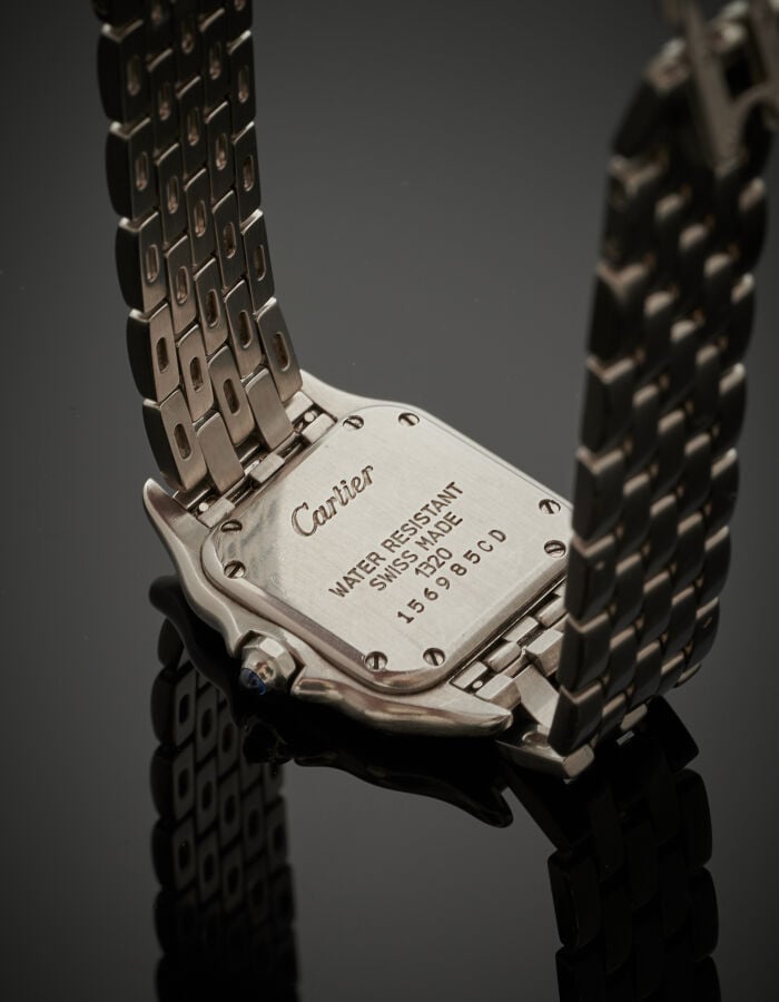 CARTIER - BRACELET MONTRE carrée de dame, "Panthère" en acier. Cadran crème, ch…