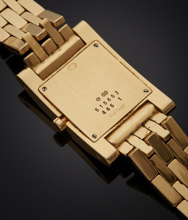 CHOPARD - BRACELET MONTRE carrée de dame en or jaune (750‰) bombé. Cadran satin…