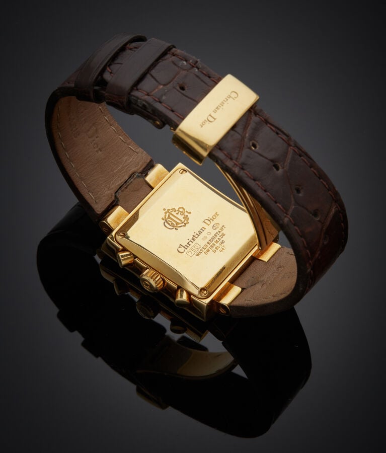 CHRISTIAN DIOR - BRACELET MONTRE "Riva" rectangulaire chronographe en or jaune…