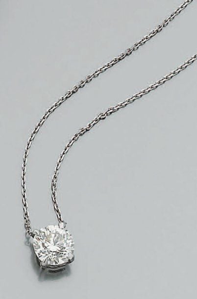COLLIER chaînette en or gris serti d'un diamant de taille ancienne pesant environ 1,7 ct (non desserti