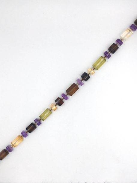 COLLIER composé de perles cylindriques de citrines, améthystes et quartz verst et quartz fumé