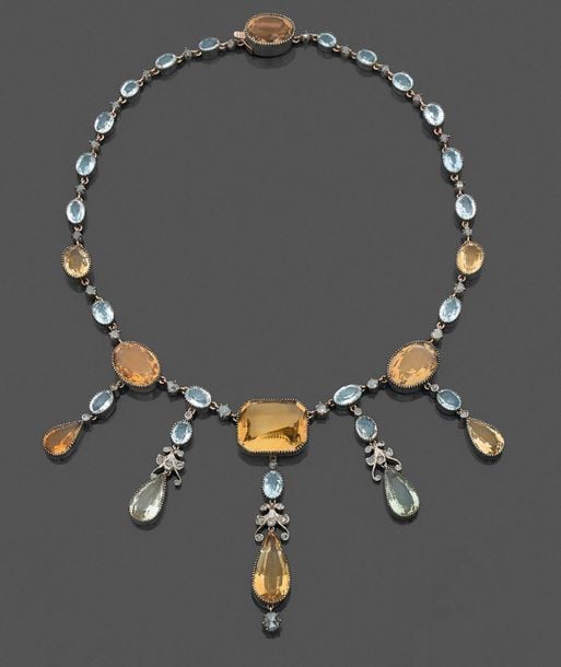 •COLLIER «draperie» en or rose (375‰) 9 carats et argent (mi