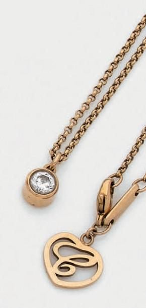 COLLIER en or rose (750 millièmes) composé d'une chaînette retenant un diamant en serti clo