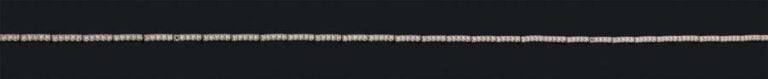 COLLIER en platine (900 millièmes) articulé serti d'un alignement de 215 diamants (manque deux diamants