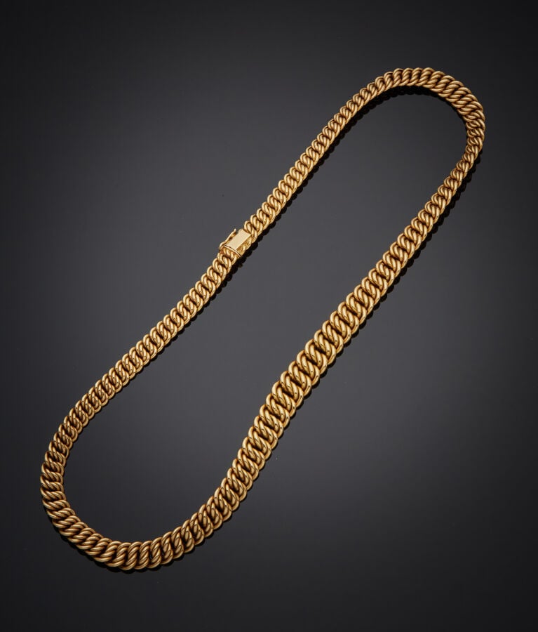 COLLIER et BRACELET en or jaune (750‰) à maille américaine en chute. - Travail…