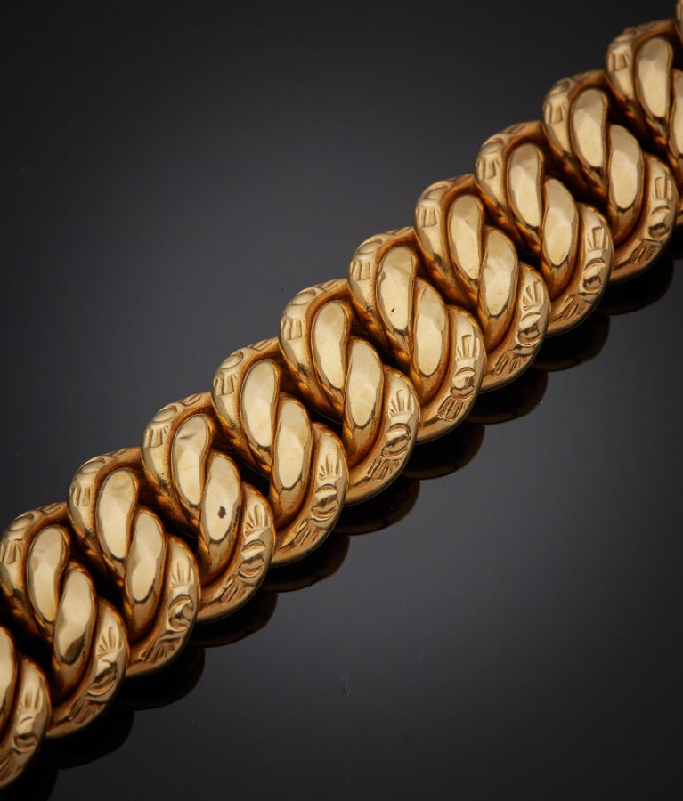 COLLIER et BRACELET en or jaune (750‰) à maille américaine en chute. - Travail…