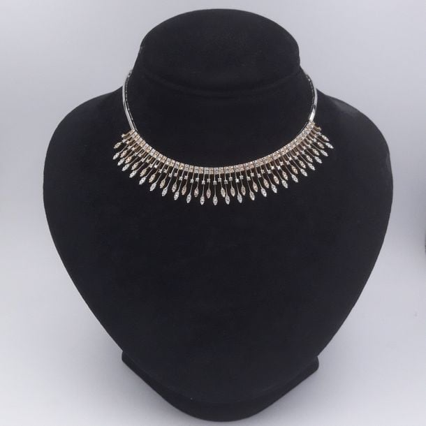 COLLIER et BRACELET «franges» en or jaune et or gris (750 millièmes) serti de diamant