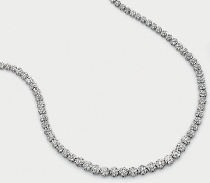 COLLIER «fleurettes», en or gris (375 millièmes) 9 carats, entièrement serti de diamants taille brillant, en chut