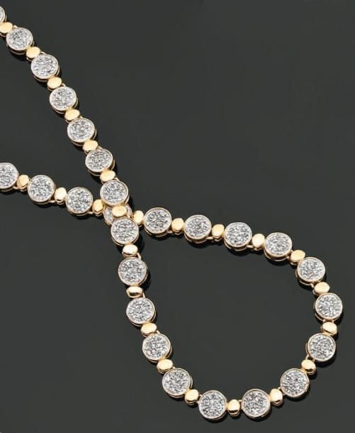 COLLIER « pastilles » articulé en or jaune et or gris serti de diamants, à motifs circulaires alterné