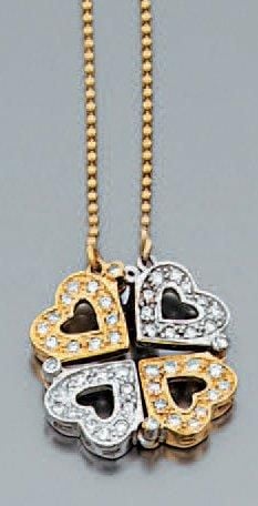 COLLIER «quatre coeurs articulés pouvant former un trèfle» en or jaune et or gris sertis de diamant