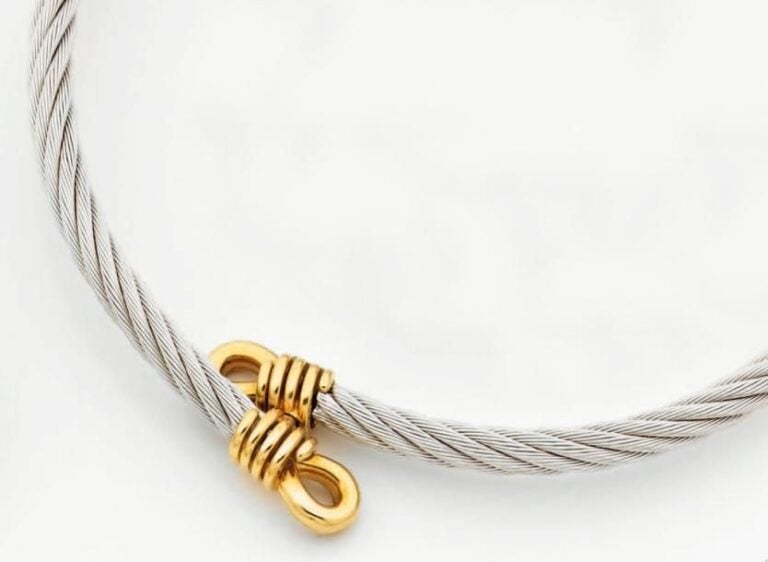 COLLIER rigide «Force 10» en or jaune godronné et acier torsad