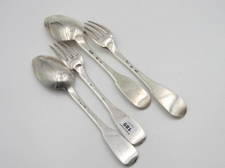 Deux couverts en argent uniplat (repolis)