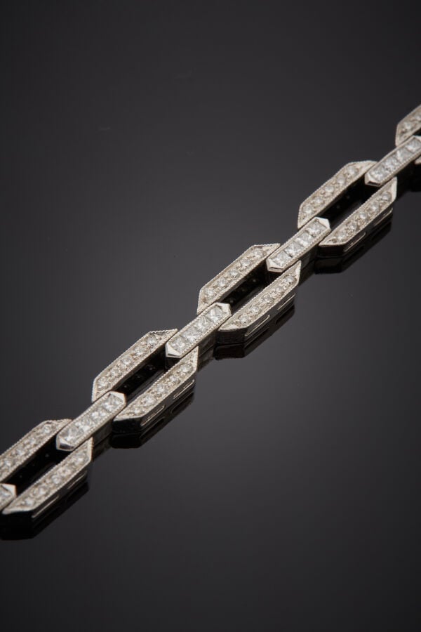 DIAFINI - BRACELET en or gris (750‰) ajouré, à maillons hexagonaux, serti d'ali…