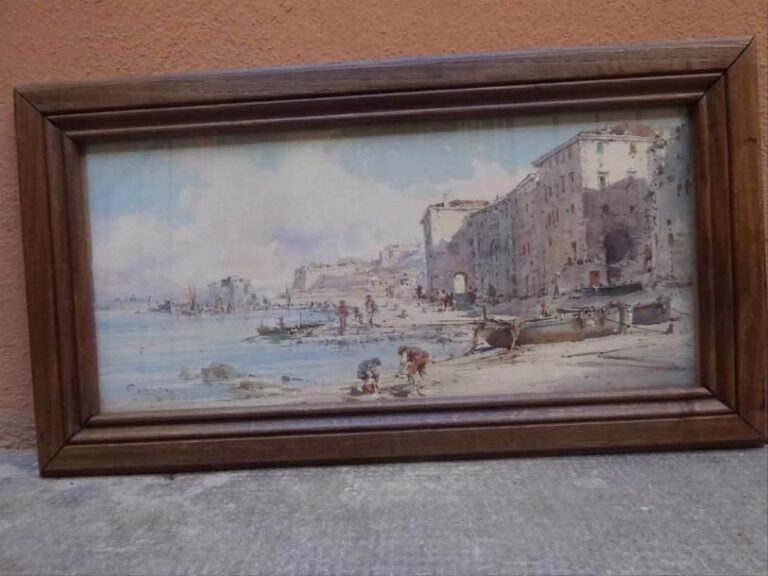 Emmanuel COSTA (1833-1921) La plage animée, peut-être à Villefranche-sur-Mer Aquarelle sur papier Signée en bas à gauche Dans son encadrement et sous verre 21,5 x 57,5 cm (à vue)