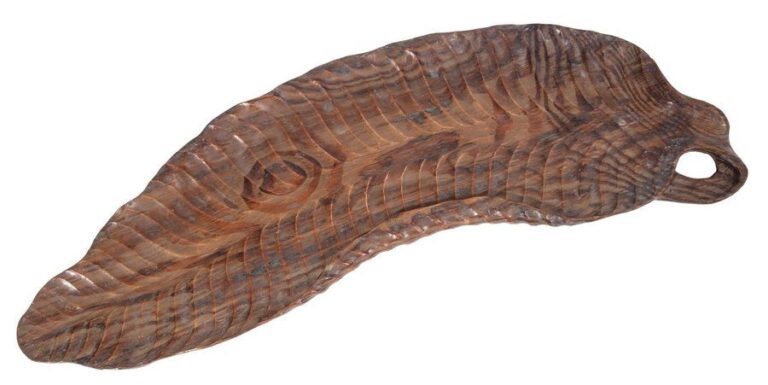 Feuille de bananier en bois sculpté utilisée comme platea