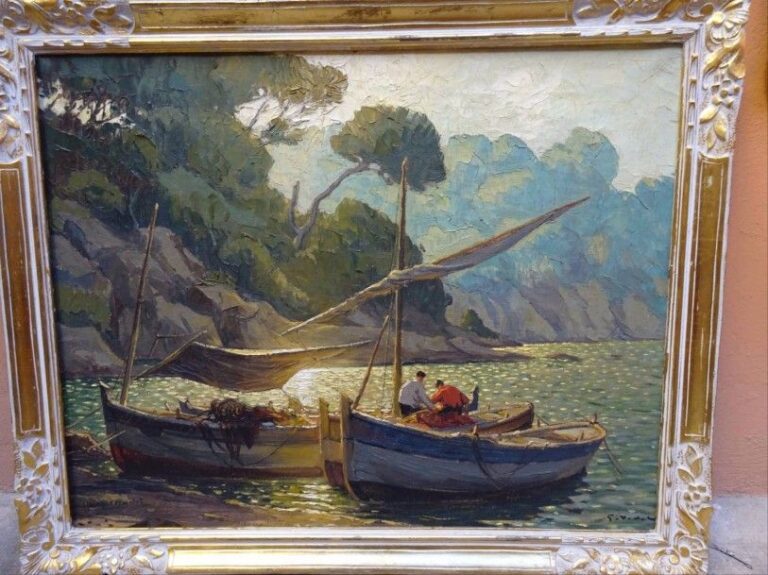 Georges VIDAL (Actif XXe siècle) Effet de soleil sur des barques de pêcheurs dans les calanques Huile sur toile Signée en bas à droite Titrée au crayon sur le châssis au dos (illisible) 73 x 92 cm