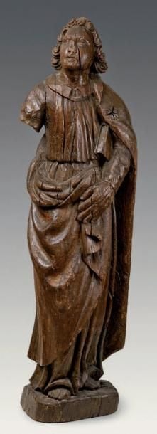 Grande figure de Saint en chêne sculpté à canon longilign