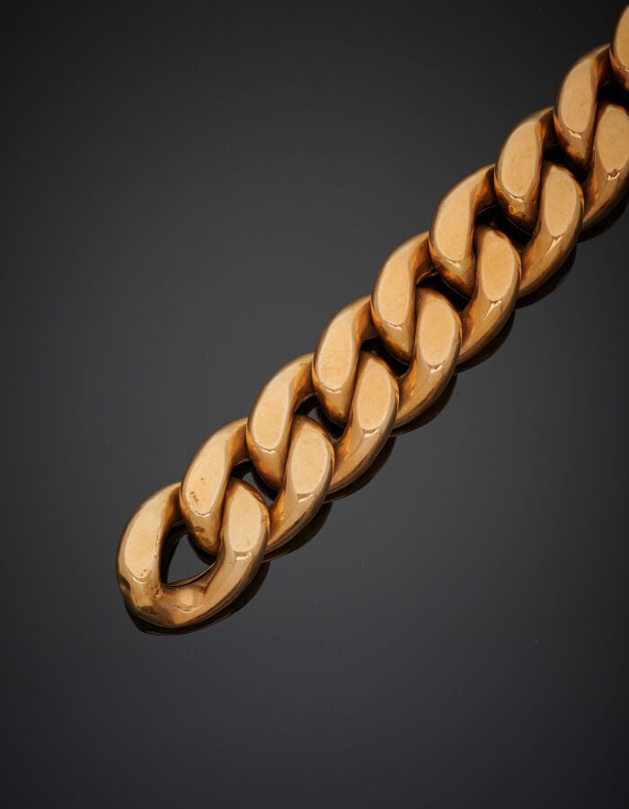 Important BRACELET "gourmette limée" en or jaune (750‰). Fermoir bâtonnet. Lége…