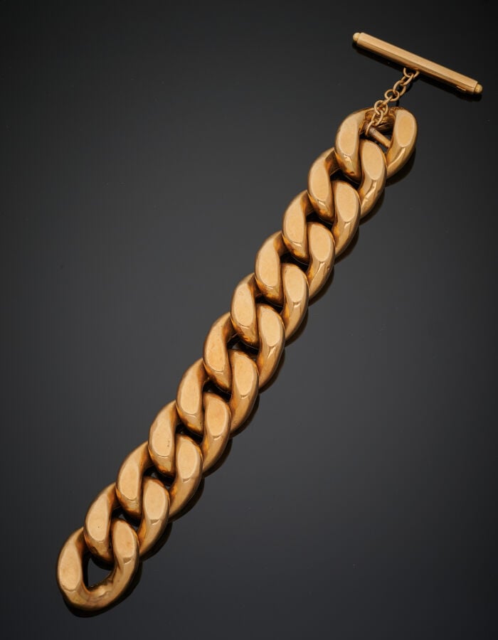 Important BRACELET "gourmette limée" en or jaune (750‰). Fermoir bâtonnet. Lége…