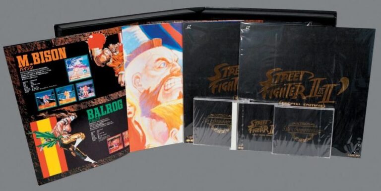 Jeux Vidéo Coffret 5e anniversaire Street Fighter 2 collectors box - Apparu au Japon au moment de la suprématie de street fighter en arcade et sur console, ce coffret témoigne d'un moment clé de l'histoire du jeu vidéo, l'ère des jeux de comba