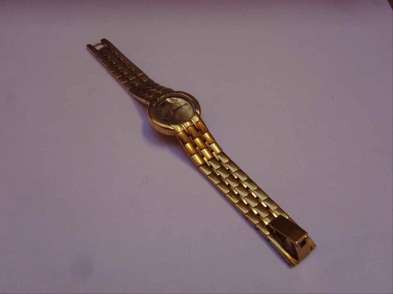 KASPARIAN Montre bracelet en métal doré, système quartz, cadran nacr