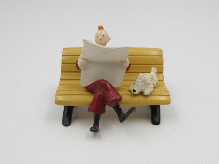 « L'oreille cassée » Tintin et Milou sur un banc public