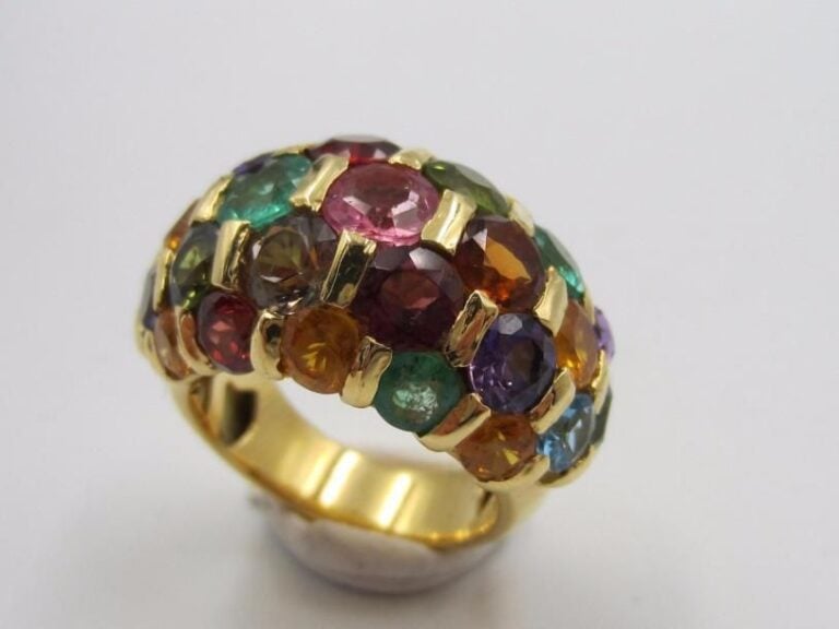 Large BAGUE jonc « Tutti frutti » en or gris (18 carats) partiellement pavé de pierres précieuses multicolore